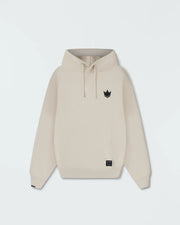 Beige BJJ pullover hoodie flat lay front product shot showing dark crown logo and kangaroo pocket