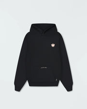 Black BJJ pullover hoodie flat lay front product shot showing crown chest logo and jiu jitsu motion script