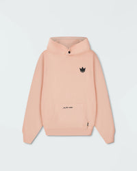 Peach BJJ pullover hoodie flat lay front product shot showing dark crown logo and jiu jitsu motion script