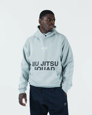 Sea foam green BJJ hoodie relaxed front pose on adult male model with hood loose and arms at side