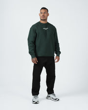 Kingz Solo Crewneck - Front Standing View - Boxy Fit and Chest Logo Print - Dark Forest Green - BJJ Streetwear Crewneck