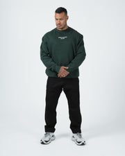 Kingz Solo Crewneck - Worn Pose View - Soft Fleece Drape and Chest Print - Dark Forest Green - BJJ Streetwear Crewneck