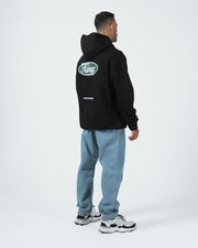 Kingz JJ Dept Hoodie - Rear Three Quarter View - Back Oval Print and Boxy Drape - Black - BJJ Streetwear Hoodie