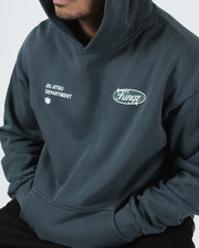 Kingz JJ Dept Hoodie - Hood Up Worn View - Chest Oval and Kangaroo Pocket - Charcoal Blue - BJJ Streetwear Hoodie