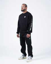 Kingz No Days Off Crewneck - Full Body Worn View - Crown Logo and Sleeve Print - Black - BJJ Streetwear Crewneck