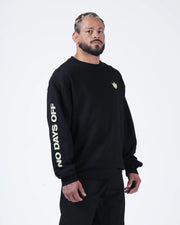 Kingz No Days Off Crewneck - Upper Body Front View - Crown Logo and Bold Sleeve Print - Black - BJJ Streetwear Crewneck