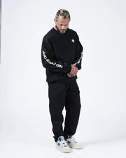 Kingz No Days Off Crewneck - Worn Pose View - Both Sleeves No Days Off Print - Black - BJJ Streetwear Crewneck