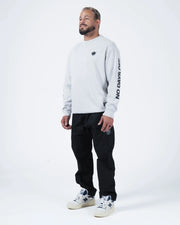 Kingz No Days Off Crewneck - Side Angle Worn View - No Days Off Sleeve Print - Light Grey - BJJ Streetwear Crewneck