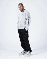 Kingz No Days Off Crewneck - Relaxed Worn View - Sleeve Print and Crown Chest Logo - Light Grey - BJJ Streetwear Crewneck