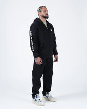 Kingz No Days Off Zip Up Hoodie - Full Body Lifestyle Shot - Complete Tracksuit Look - Black - BJJ Streetwear Hoodie