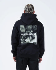 Black BJJ hoodie back graphic closeup of Pursue The Gentle Art rose photo print and Kingz Kimonos text