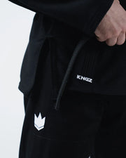 Kingz Kore V2 BJJ Gi Black - Angled Front View Male Athlete Full Body Black Gi Set IBJJF Competition Kimono and Pants