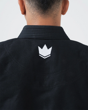 Kingz Balistico 4.0 BJJ Gi Black upper back closeup showing white crown logo below collar