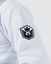 Kingz Balistico 4.0 BJJ Gi White upper arm closeup showing detailed black crown shield crest patch