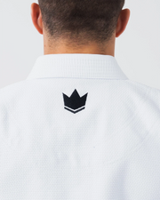 Kingz Balistico 4.0 BJJ Gi White upper back closeup showing black crown logo below rubber collar