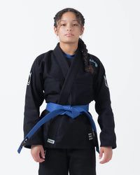 Kingz Nano 3.0 Women's BJJ Gi Black - Upper Body Front View Female Athlete Blue Belt NANO Text KINGZ Logo 380gsm Pearl Weave