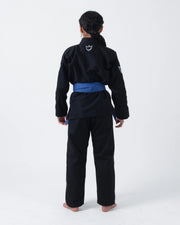 Kingz Nano 3.0 Women's BJJ Gi Black - Full Body Straight Back View Female Athlete Blue Belt Crown Logo Upper Back