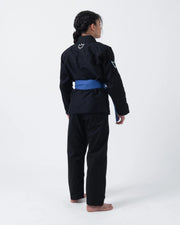 Kingz Nano 3.0 Women's BJJ Gi Black - Full Body 3/4 Back View Female Athlete Blue Belt Crown Logo Back Sleeve Women's Cut