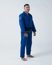 Kingz Nano 3.0 BJJ Gi Blue - Athlete Wearing Blue Kimono 3/4 Angle View Competition Gi