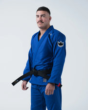 Kingz Nano 3.0 BJJ Gi Blue - Side Angle View Upper Body Lightweight Embroidered Crown Patch