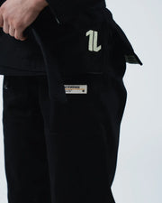 Kingz The ONE V2 Women's Jiu Jitsu Gi - Black - Close-Up Detail View Embroidered 1L Logo Left Shoulder Kingz Kimonos Patch Front Waist Black Fabric BJJ Gi [color:Black]