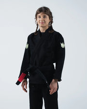 Kingz The ONE V2 Women's Jiu Jitsu Gi - Black - Front View Female Athlete Black Gi White Crown Shoulder Patches Black Belt Red Tip Durable Fabric BJJ Gi Training [color:Black]