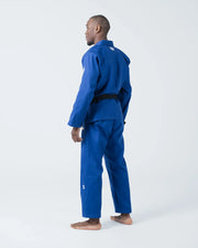 Kingz The ONE V2 BJJ Gi Blue three-quarter back view showing white crown logo below collar and belt