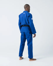 Kingz The ONE V2 BJJ Gi Blue rear three-quarter angle showing back panel crown logo and sleeve patch