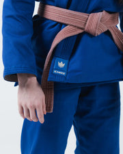 Kingz The ONE V2 Women's Jiu Jitsu Gi Blue - Close-Up Detail View Blue Gi Brown Belt Kingz Crown Logo Patch Left Waist Durable Weave Fabric BJJ Gi Training [color:Blue]