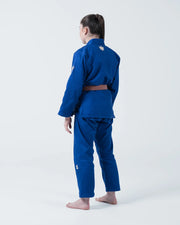 Kingz The ONE V2 Women's Jiu Jitsu Gi - Blue - Back View Female Athlete Blue Gi Crown Logo Back Shoulder Brown Belt Durable Fabric BJJ Gi Training [color:Blue]