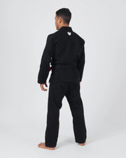 Kingz The ONE V2 BJJ Gi Black three-quarter back view showing white crown logo below collar and belt