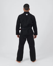 Kingz The ONE V2 BJJ Gi Black full body back view showing crown logo on upper back and tied belt