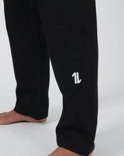 Kingz The ONE V2 BJJ Gi Black pants leg closeup showing white number one logo on ripstop fabric