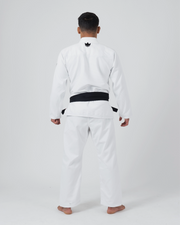 Kingz The ONE V2 BJJ Gi White full body back view showing crown logo on upper back and tied belt
