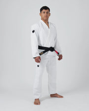 Kingz The ONE V2 BJJ Gi White side profile view showing gi jacket pants black belt and crown logo