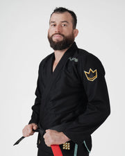 Kingz Nano 3.0 Terra LE BJJ Gi Black three-quarter view showing gold crown sleeve patch and belt