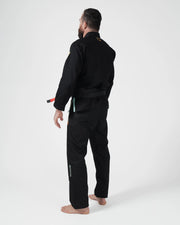 Kingz Nano 3.0 Terra LE BJJ Gi Black three-quarter back view showing gold crown accent and pant logo