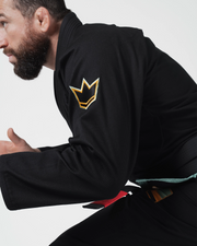 Kingz Nano 3.0 Terra LE BJJ Gi Black arm detail showing gold crown sleeve patch and Terra accents