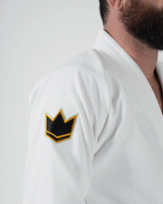 Kingz Nano 3.0 Terra LE BJJ Gi White sleeve closeup showing gold outlined black crown logo patch