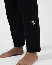 Kingz The ONE V2 LE BJJ Gi Black Green pants leg closeup showing green number one logo on ripstop