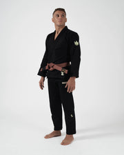 Kingz The ONE V2 LE BJJ Gi Black Green full body front view showing complete gi set and brown belt
