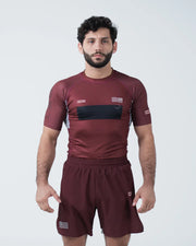Kingz Trooper Rashguard Maroon - Full Body Front View Male Athlete Short Sleeve KINGZ Logo Black Chest Band Flag Patch Sublimated Graphics