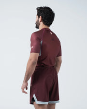 Kingz Trooper Rashguard Maroon - Full Body Back View Male Athlete Short Sleeve Crown Logo Upper Back Side Seam Detail Maroon Shorts