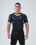 Kingz Player Special Limited Edition Rashguard Black Gold - Full Body Front View Male Athlete Short Sleeve Black Gold Chevron Motorsport Design Number 1 Crown Logo Tainan Dalpra [color:Black]