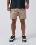 Kingz Casual Gi Shorts Khaki Tan Beige - Full Body Front View Male Athlete Khaki Tan Ripstop Casual Shorts Above-Knee Drawstring Waistband Black Woven Kingz Label Right Thigh Dark Navy T-Shirt Black White Dunk Sneakers Men's BJJ Lifestyle [color:Khaki]