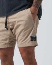 Kingz Casual Gi Shorts Khaki Tan Beige - Close Up Right Thigh Detail KINGZ KIMONOS Woven Label Black Drawstring Visible Khaki Ripstop Fabric Texture Elastic Hem Banding Men's BJJ Lifestyle Casual Shorts [color:Khaki]