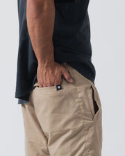 Kingz Casual Gi Shorts Khaki Tan Beige - Close Up Front Pocket Detail Hand in Pocket Crown Logo Pocket Edge Khaki Ripstop Fabric Side Seam Dark Navy T-Shirt Men's BJJ Lifestyle Casual Shorts [color:Khaki]