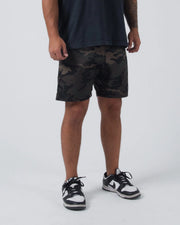 Kingz Casual Gi Shorts Camo Dark Military - 3/4 Front View Male Athlete Dark Military Camo Ripstop Shorts Above-Knee Drawstring Waistband Dark Navy T-Shirt Black White Dunk Sneakers Men's BJJ Lifestyle [color:Dark/Camo]