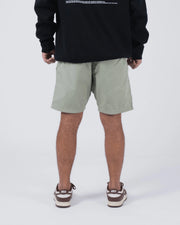 Kingz Casual Gi Shorts Sage Stone Green - Full Body Back View Male Athlete Sage Ripstop Casual Shorts Relaxed Fit Back Pockets Clean Back Panel Black Hoodie Brown Nike Dunk Sneakers Men's BJJ Lifestyle [color:Stone Green]