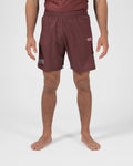 Kingz Trooper Shorts Maroon - Full Body Front View Male Athlete Maroon Burgundy Color KINGZ Badge Right Thigh Flag Badge Left Leg Inner Compression Shorts Gray Trim Competition Cut Men's Grappling Shorts No-Gi BJJ